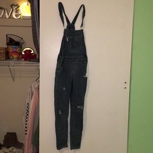 ripped jean overalls